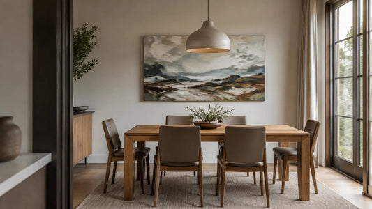 Original landscape abstract canvas above a light-oak dining table with six upholstered chairs and one sculptural pendant